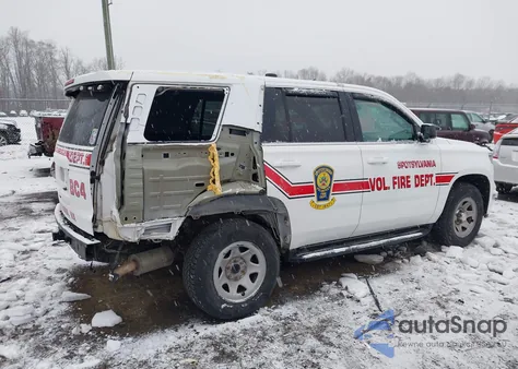 2015 Chevrolet Tahoe Commercial Fleet z USA, uszkodzony, nr VIN 1GNSK3EC2FR574621